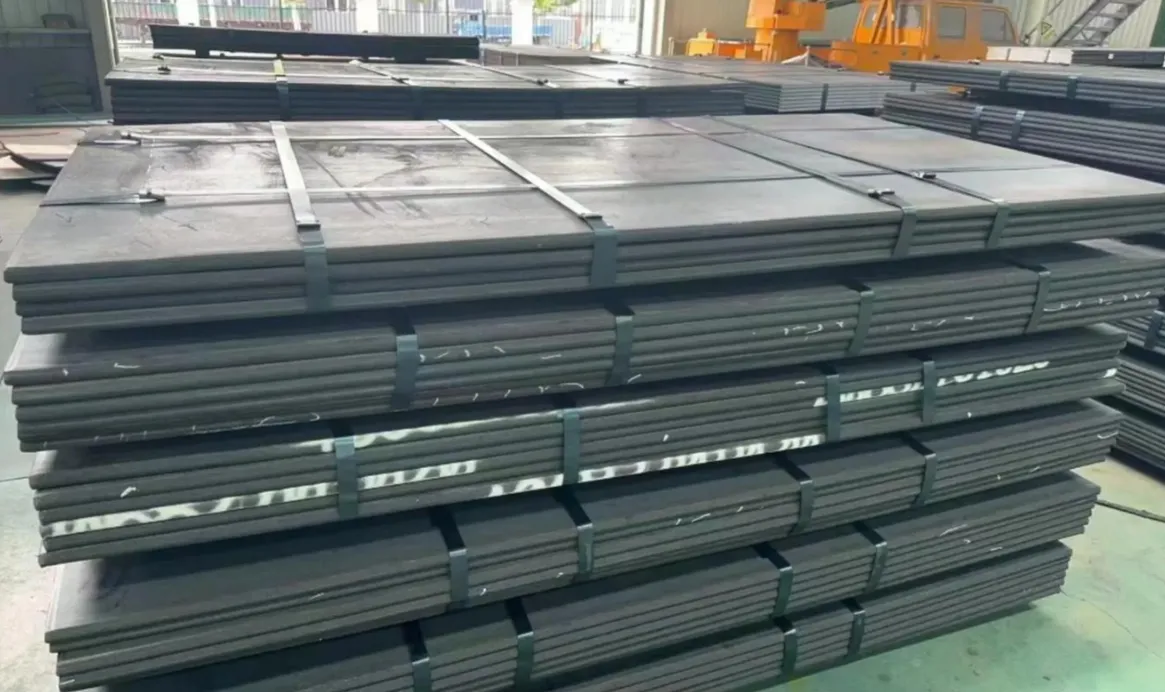 A36 steel plate in stock from Chinese manufacturer stacked in warehouse ready for structural and construction applications