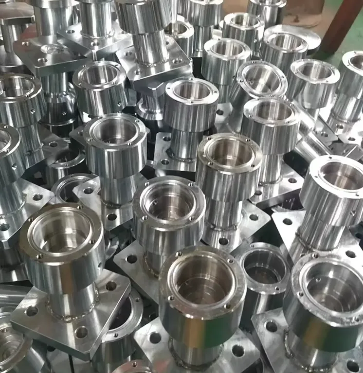 Mirror-polished stainless steel components by MWalloys displaying a high-gloss reflective surface and precision-machined finish.